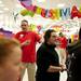 Target employee Joe Zimmerman directs shoppers as they enter on Thursday. Daniel Brenner I AnnArbor.com